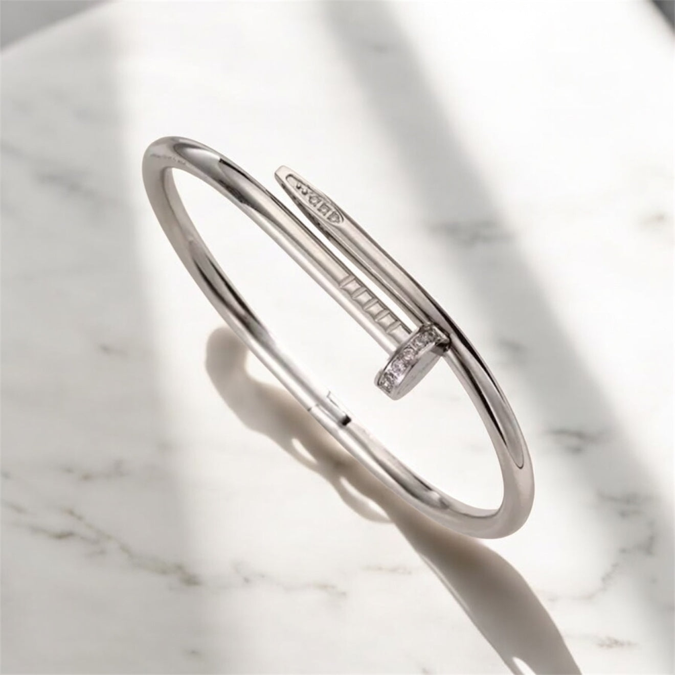 Kartier Silver Bangle