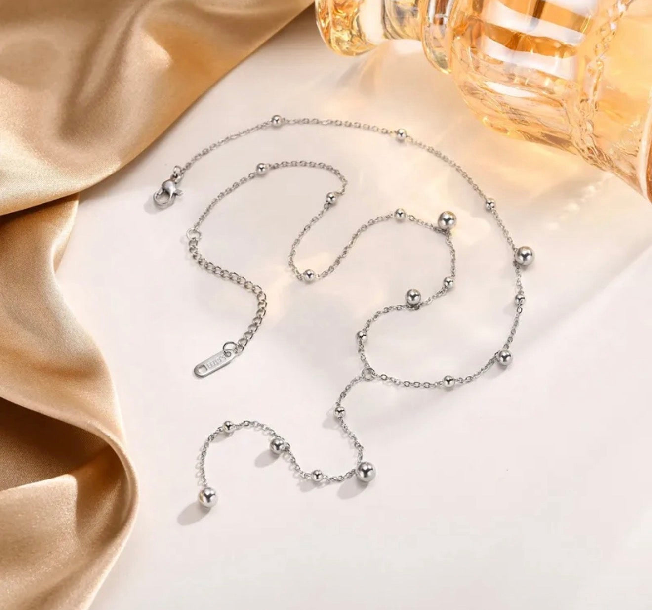 Collar de gotas de plata