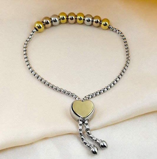 Pulsera de corazón bicolor